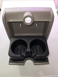 09-14 Ford F-150 Center Console Rear Fold Down Cup Holder Tan. Fixed Price $125.00.